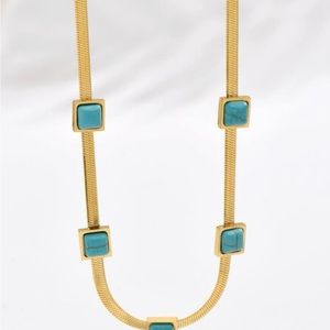 Bran new fashion jewelry. Gold with turquoise jewels.